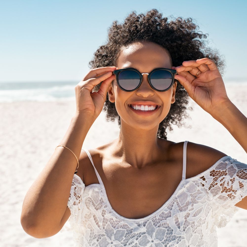 Women wearing sunglasses to protect her eyes from UV rays